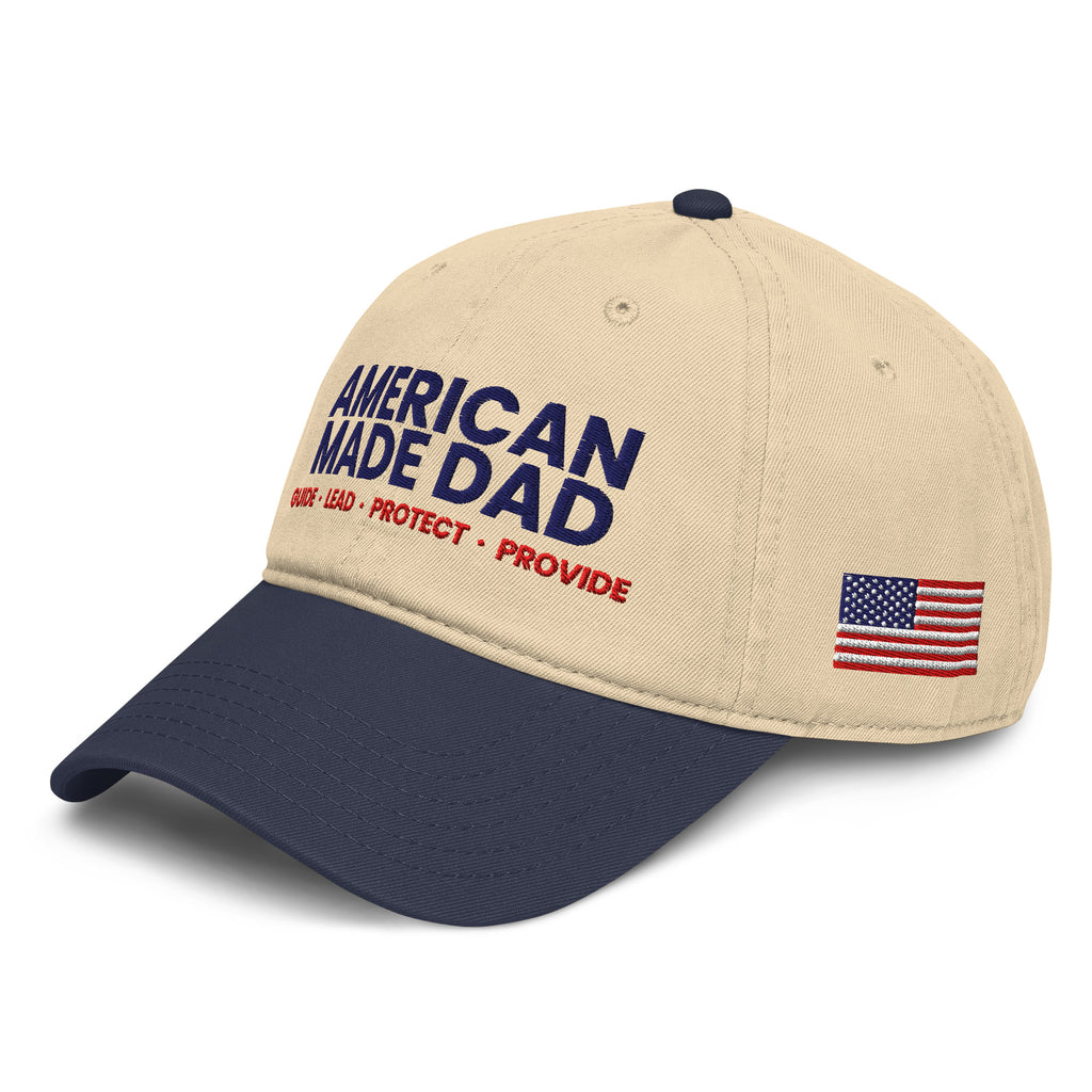 Left angle of a navy and khaki garment washed cap with the embroidered compass on the front