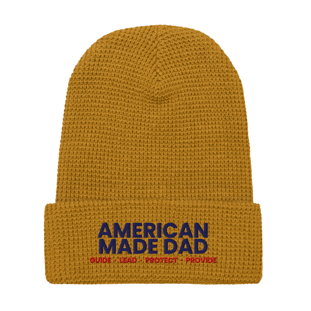 Front of a camel waffle knit beanie with the embroidered American Made Dad compass