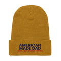 Front of a camel waffle knit beanie with the embroidered American Made Dad compass